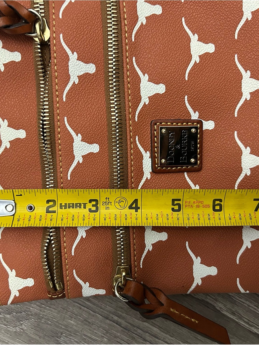Dooney & Bourke Rust Brown Crossbody with White Print and Gold Hardware